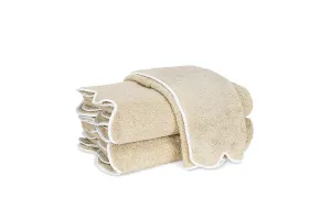 Cairo Scallop Sand with White Towels by Matouk